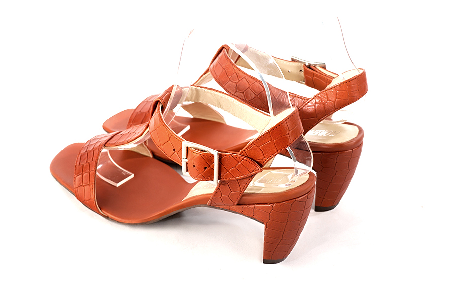 Women's terracotta orange elegant fully open instep strap sandals. Square toe. Medium comma heels - Rear view
